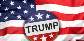 Button with "Trump" on American flag.