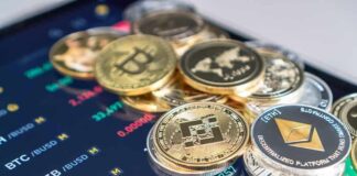 Cryptocurrency coins on a trading screen background.