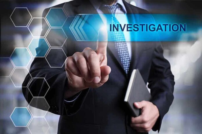 Man in suit pointing at "Investigations" text.