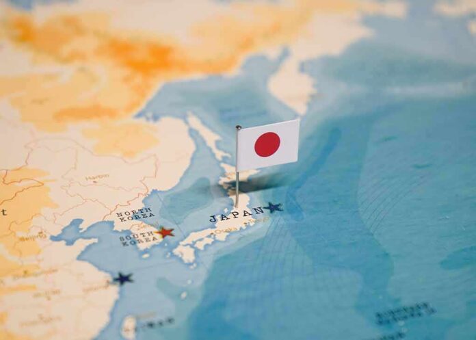 Map of Japan with flag pin placed nearby
