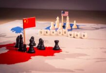 Trade war concept with chess pieces and flags