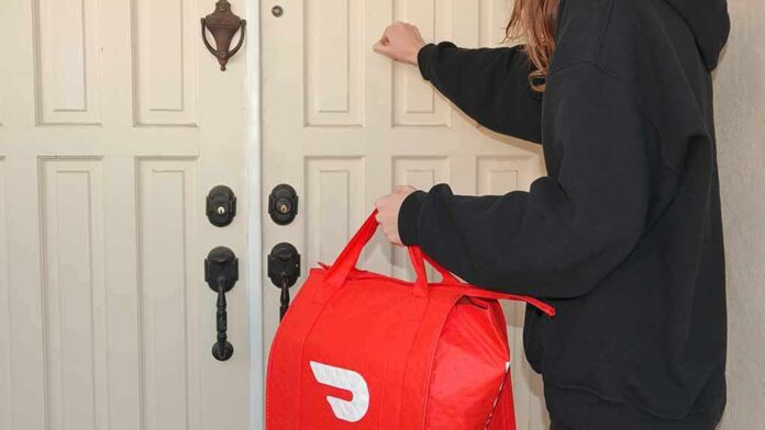 Person delivering food knocking on a door