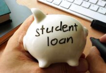 Person holding piggy bank labeled student loan