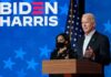 Two people speaking at a Biden Harris event