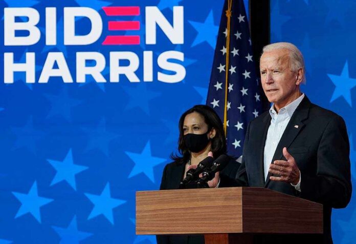 Two people speaking at a Biden Harris event