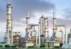 Industrial plant with metal towers and pipes