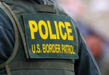 Police U S Border Patrol uniform close up