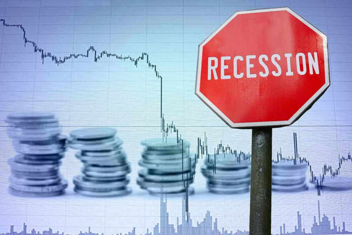 Recession sign, coin stacks, downward stock chart background.