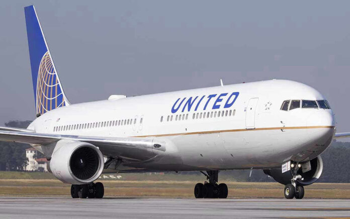 United Airlines plane on the runway.