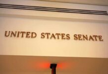 Sign displaying United States Senate in a government building