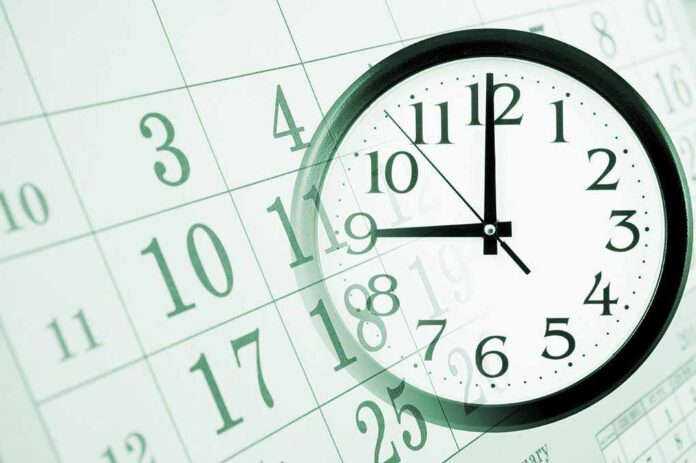 shutterstock_173563493.jpg A clock overlaying a calendar, illustrating the concept of time management