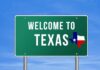 Welcome to Texas road sign with a Texas map