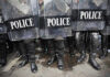 Palace INVADED — Government Crumbling Police officers in riot gear holding shields.
