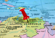 Trump Changes The RULES – Venezuela’s CARTEL Now VULNERABLE Red pin on Venezuela, South America map.