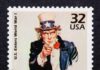 Vintage stamp featuring Uncle Sam pointing with the text I WANT YOU