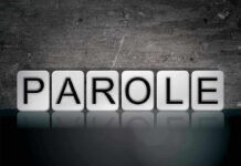 16 Arrests Later — Parole Board’s HORRIFIC Mistake Blocks spelling PAROLE on grungy background.