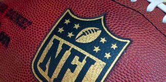 Close-up of an NFL football with the logo prominently displayed