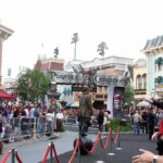 Crowd gathered at a Disney theme park for a Pirates of the Caribbean event