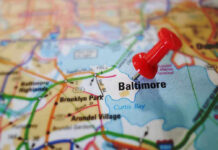 Red pushpin marking Baltimore on a map.