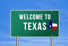 Welcome to Texas road sign with a Texas map