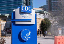 Airport SCREENINGS Return After CDC Issues OUTBREAK Warning! Sign for CDC Edward R. Roybal Campus.