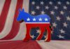 Dem Candidates DISGUSTING Veteran Comments Comeback To Haunt Him A donkey symbol representing the Democratic Party in front of an American flag background