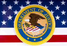 U.S Journalist CHARGED – Shocking Ties To China! Department of Justice seal on American flag background.