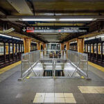 Sicko Illegal RAPED Corpse – Media Stays Silent! Subway station platform with directional signs overhead.