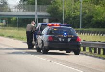 Baby THROWN From Car During 100MPH Police Pursuit! Police officer conducting a traffic stop on a highway