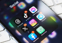 Dems Post REVOLTING Trump Meme During 4th Celebrations Smartphone showing social media app icons in a folder.