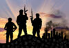 Suburban Mom ARRESTED – Funding Terrorist Movement! Three armed silhouettes near a smoky city skyline.