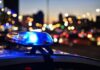 Cop Car PLOWS Into Homeless Man — Deadly Blunder Police car light bar flashing at dusk
