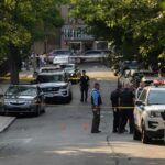 Islamization Replaces Gang Violence as Nations Worst Crime Police officers secure a residential street with patrol cars and yellow tape