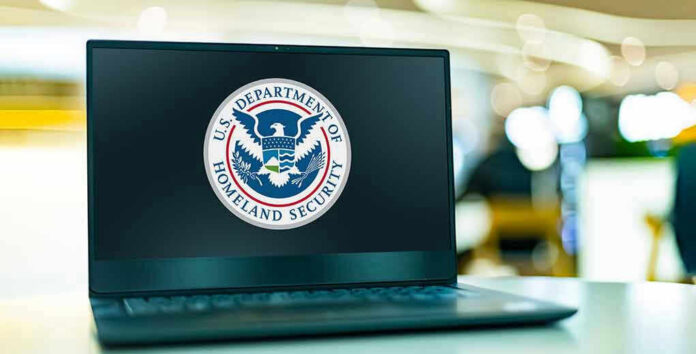 2287986767-1 Laptop displaying U.S. Department of Homeland Security logo.