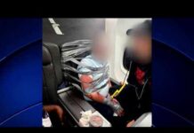 Passenger Duct-Taped Mid-Flight — UNCONTROLLABLE! Man duct-taped to seat on American Airlines flight after allegedly attacking another traveler