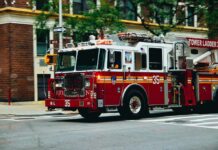 Restaurant Blaze Triggers Mayday – Firefighters TRAPPED! Fire truck turning on a city street