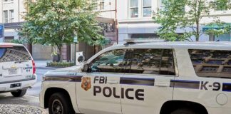 FBI police K-9 SUV parked on a city street