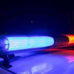 Flock Mayhem, Woman Wrongly ARRESTED! Police car light bar flashing blue and red at night