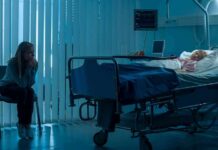 What Mother Did While Baby Died Is SICKENING hospital room with child in bed and adult sitting nearby