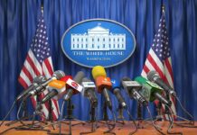 Liberal Media Sue Trump To Restore White House Access Press microphones at a White House briefing podium