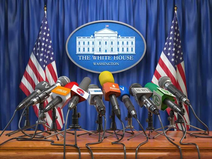 shutterstock_1186435138 Press microphones at a White House briefing podium