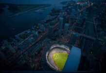 Fuming MLB Manager Announces His Own Firing Baseball stadium illuminated at night in a coastal city