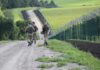 Lithuania Prepares for War – Reinforces Russian Border Soldiers patrolling along a rural border fence
