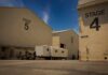 Paramount Studios Leaves California Amid Hollywood Exodus Film studio stages with numbered buildings and trailer