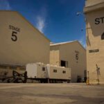 Paramount Studios Leaves California Amid Hollywood Exodus Film studio stages with numbered buildings and trailer