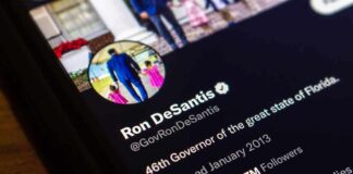 smartphone screen showing a verified social media profile