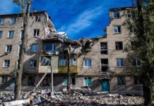 Historic Tourist Hotspot EXPLODES – Americans Among Dead! Damaged apartment building with collapsed upper floors and debris