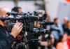 Clancy Lawyer BEGS Trump in Desperate Public Plea Video cameras on tripods at a media event