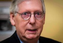 McConnell’s Return Ignites Senate Uproar elderly man with glasses in a close-up portrait