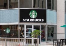 Starbucks Axes 250 Stores Amid Bankruptcy! Starbucks storefront with logo and glass entrance